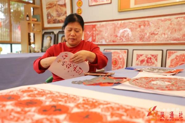 纸上生花绽异彩 匠心剪出山河美